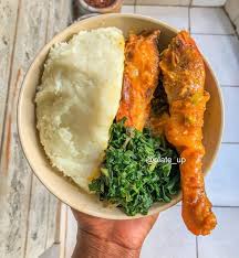 Ugali with fried chicken